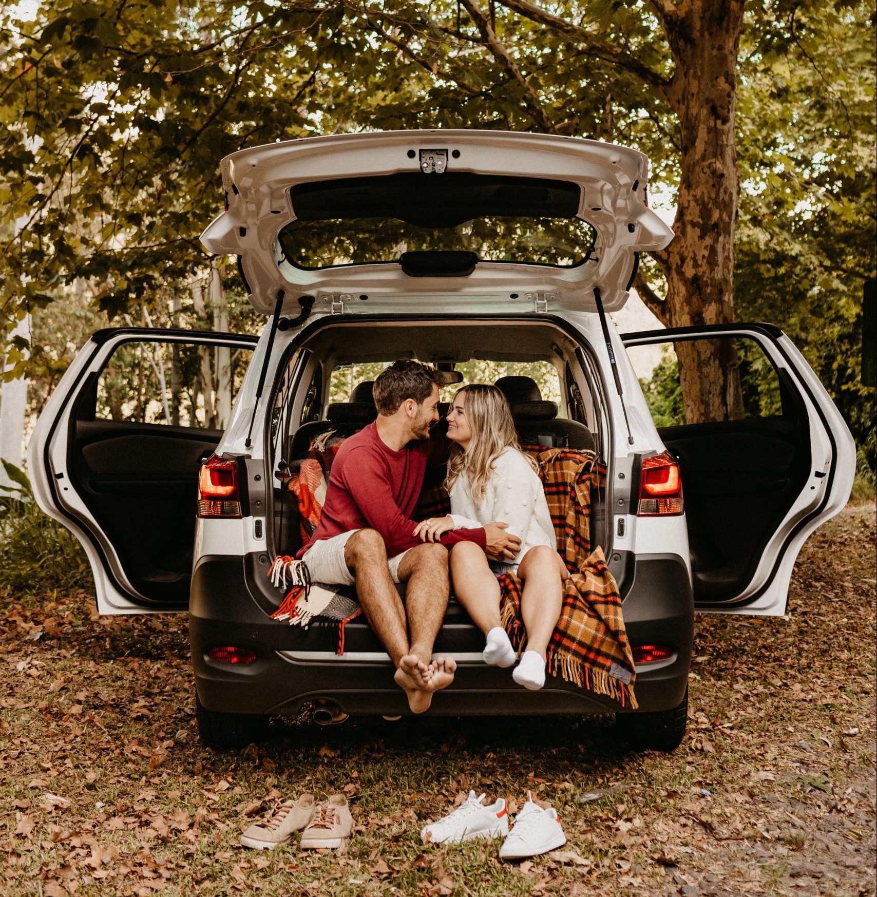 photo-of-couple-sitting-in-the-back-of-car-3021263